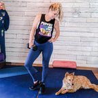Woman holding dumbbells beside her dog on a large Midnight Blue exercise mat