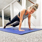 Woman doing mountain climbers on a large Midnight Blue exercise mat