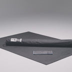 Large yoga mat in use, barefoot yoga poses