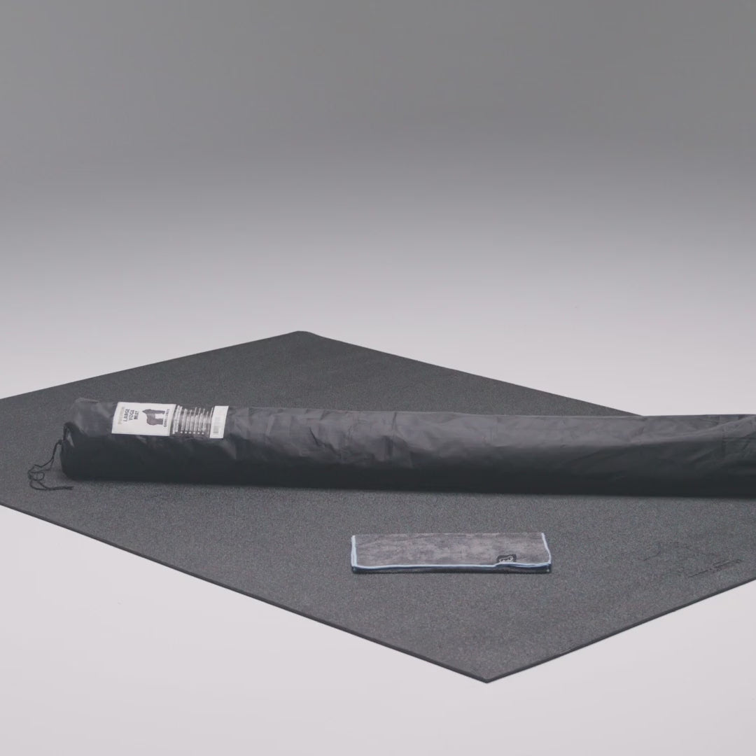 Large yoga mat in use, barefoot yoga poses